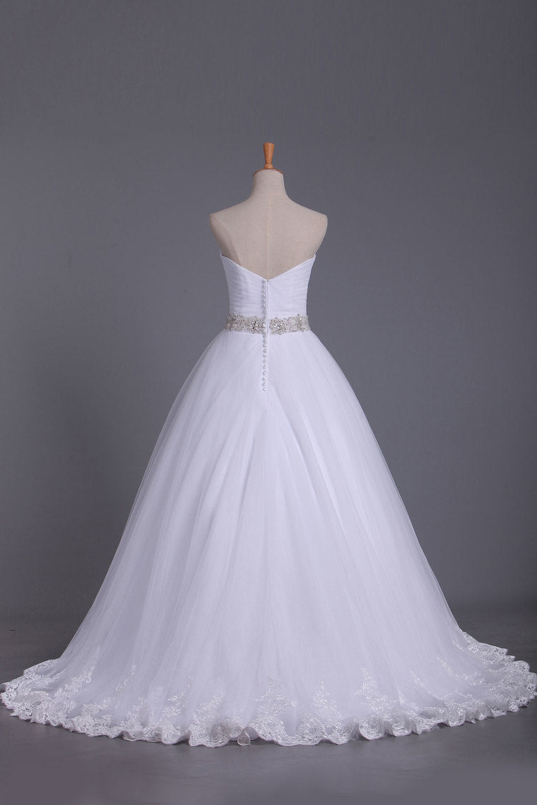 2024 Strapless Tulle Wedding Dresses A-Line With Applique & Beads